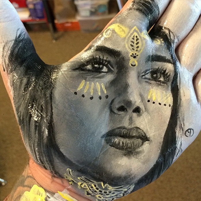 Portrait painting on the palm