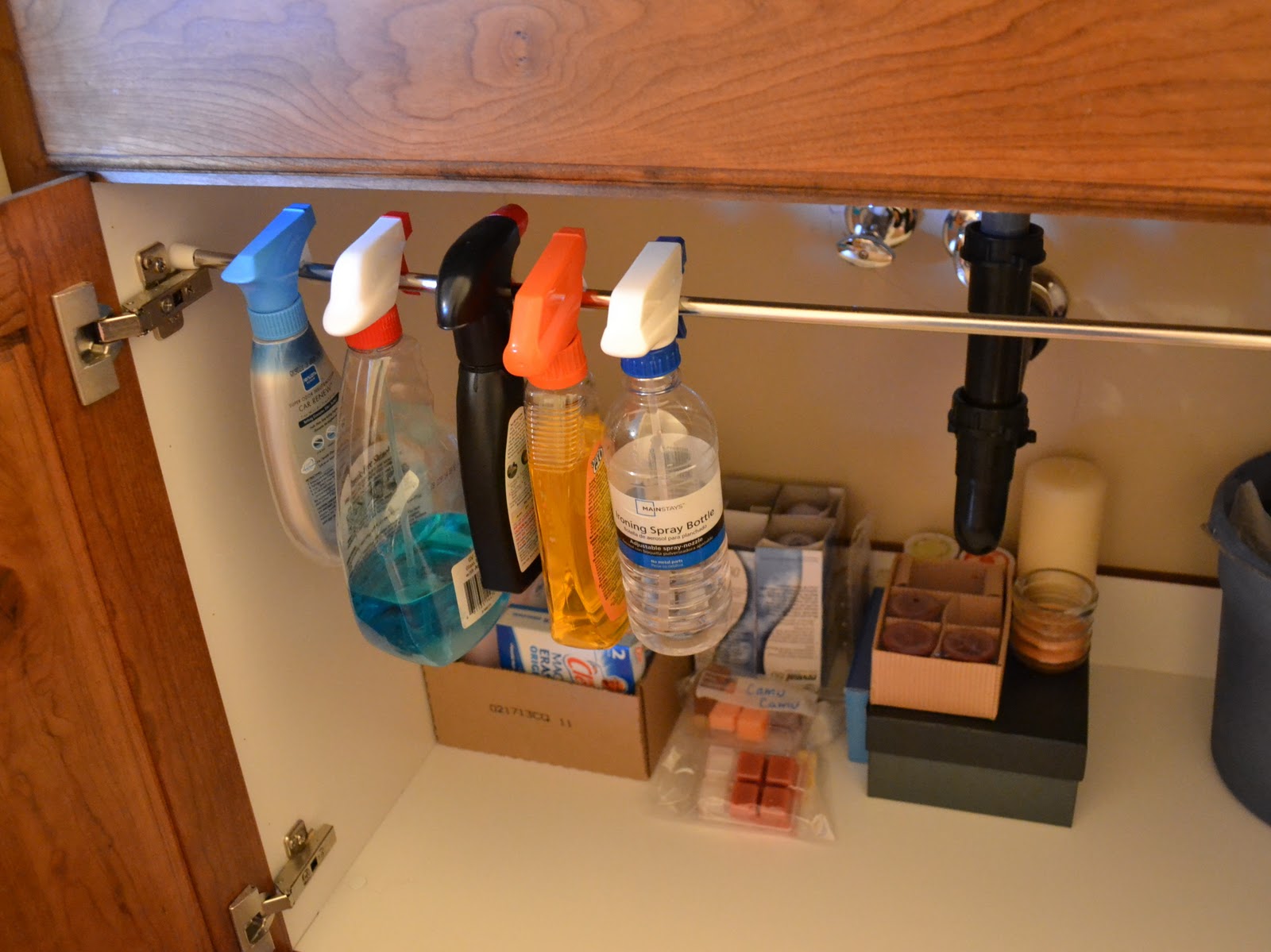 tension rod shelving under bathroom sink storage