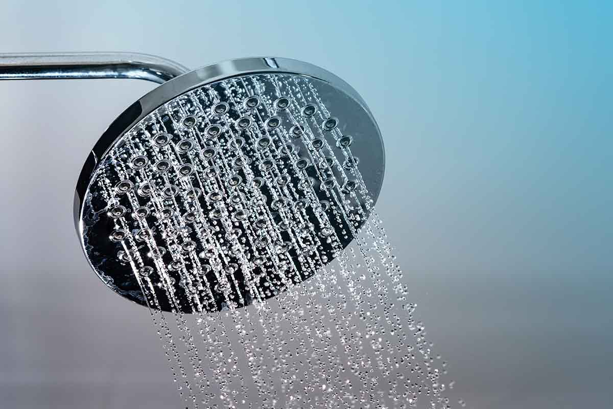 The rain shower head in conjunction with another shower feature