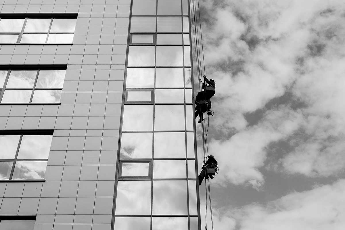industrial climbers wash the windows
